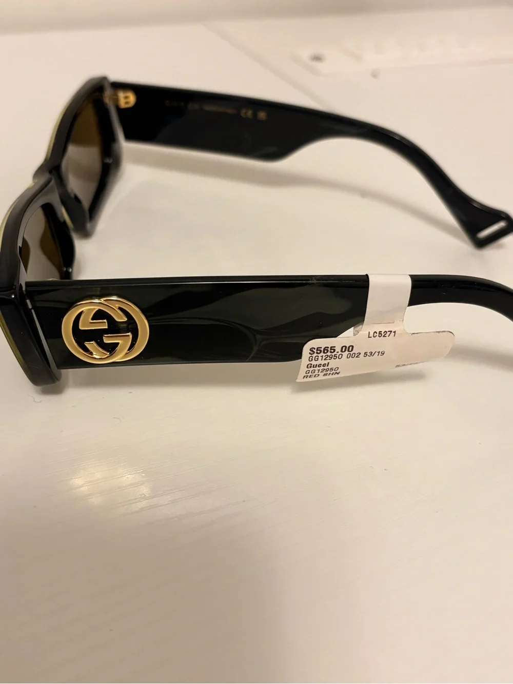 Gucci Black Sunglasses with Gold Accent Logo